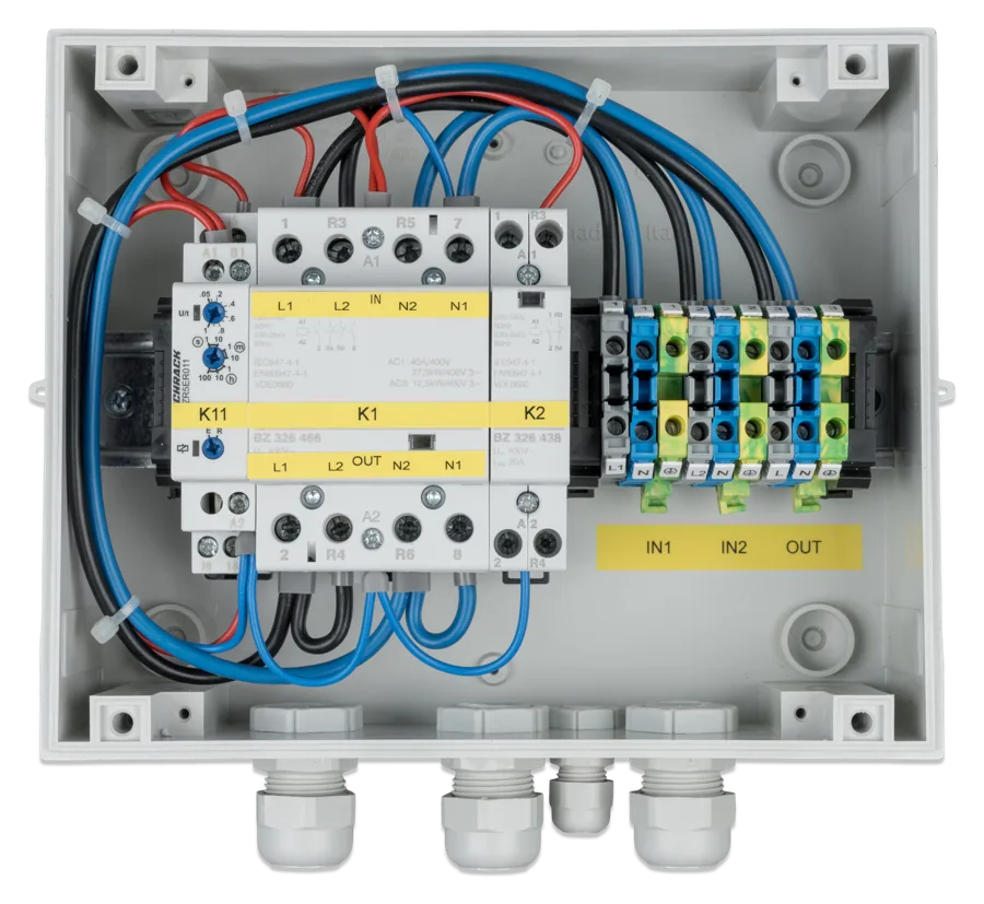 VE Transfer Switch 10 kVA without cover — timer relay K11, contactor K1 with IN and OUT labels (L1 L2 N2 N1), contactor K2, terminal block IN1 IN2 OUT