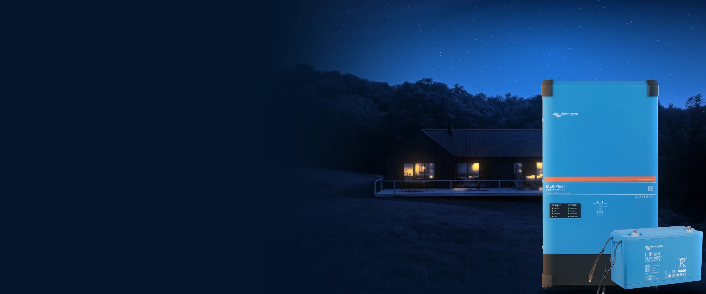 House at night, next to a MultiPlus-II inverter/charger and a Victron lithium battery