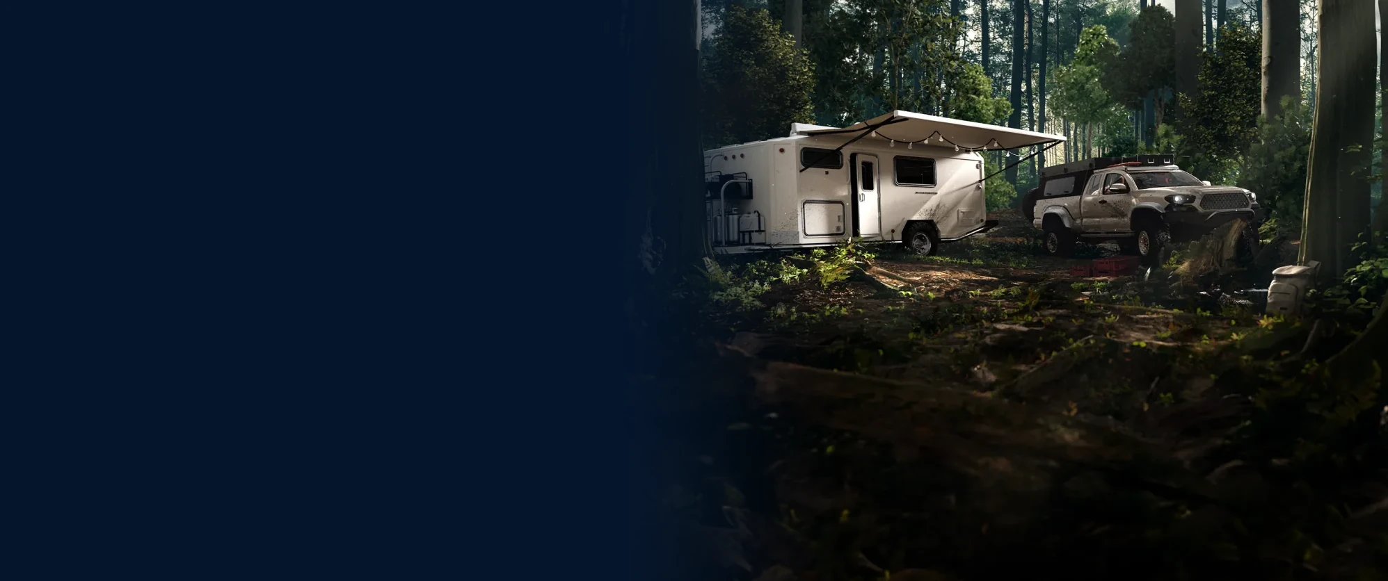 Campervan with a trailer parked in the woods