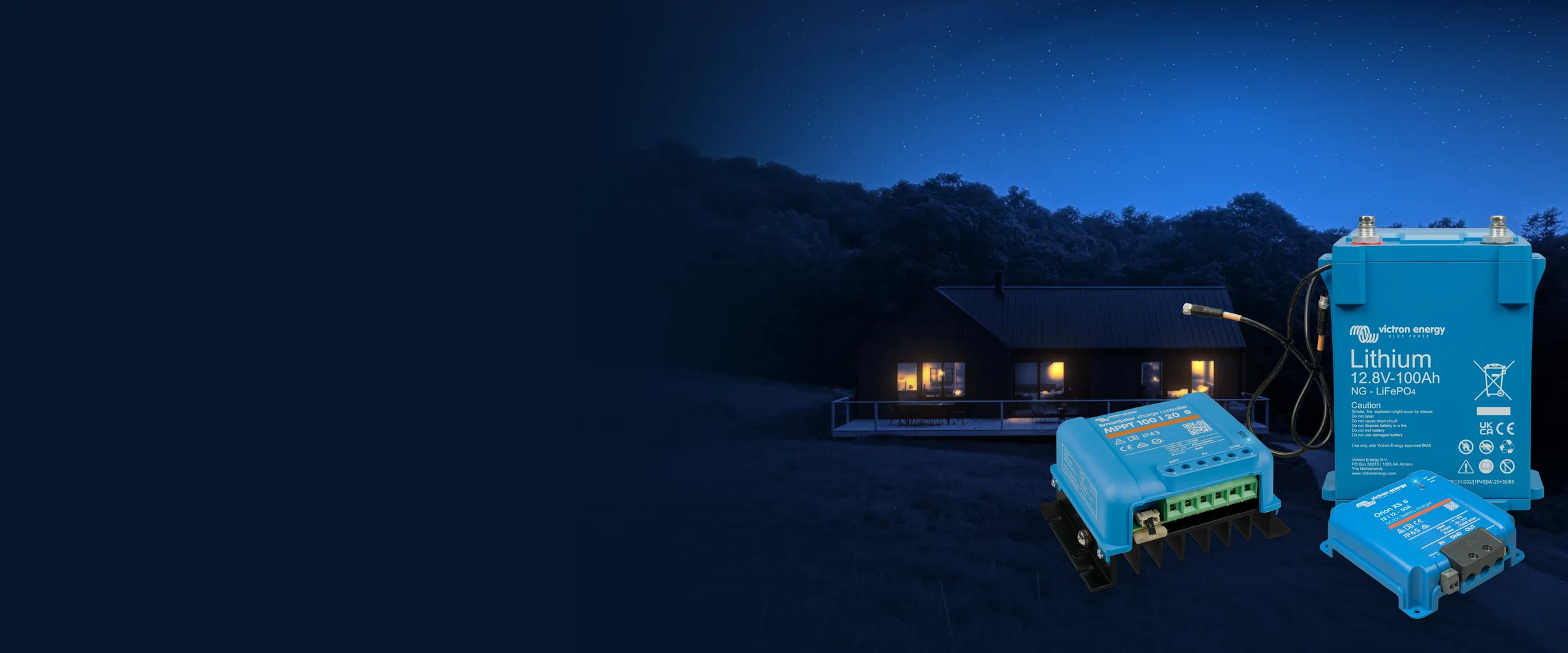 House at night, with a Lithium NG battery, SmartSolar MPPT 100/20 controller and Orion XS charger in front of it